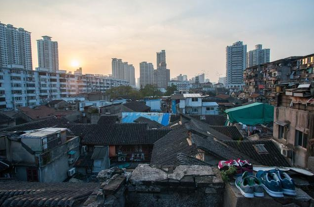 上海房屋拆遷中的數磚頭和托底保障具體指什么? 居住房屋的價值補償金額如何確定？